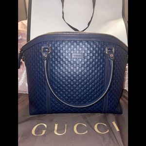 GUCCImicroGuccissima dark blue with shoulder strap.